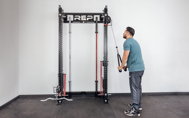 Wall-Mounted Athena being used for a Tricep Pushdown